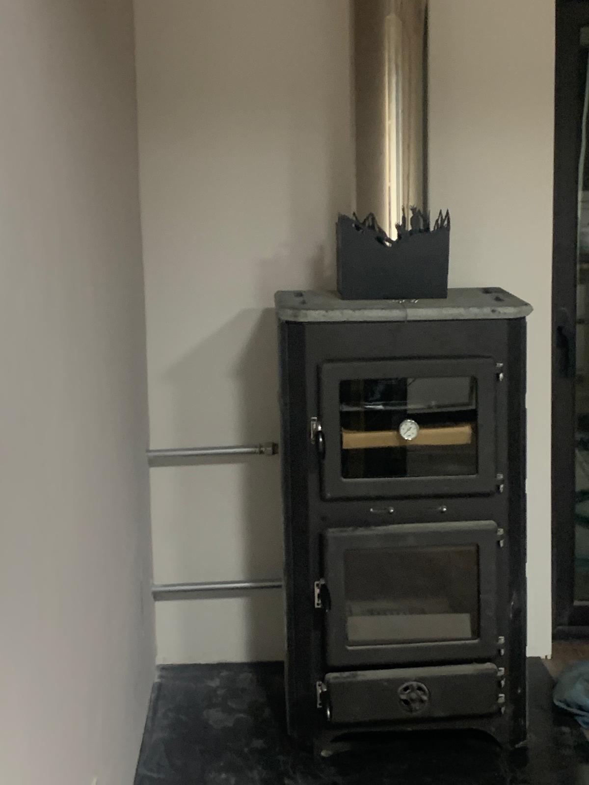 Installation poêle à bois avec conduit inox à Charleroi